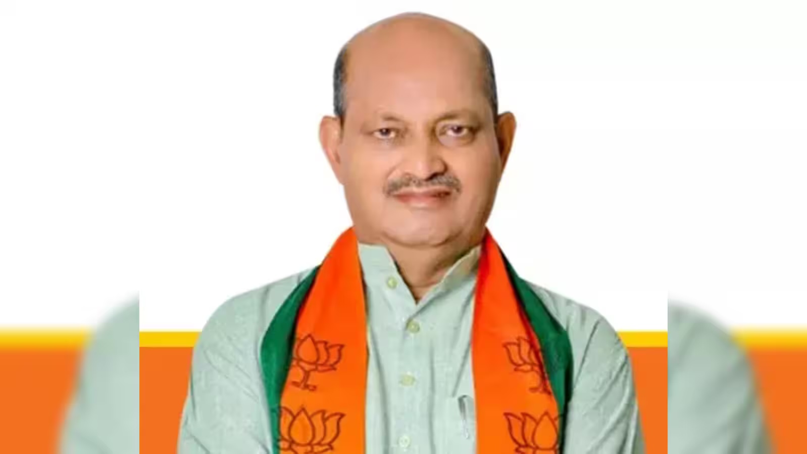 Portrait of Manmohan Samal in a light kurta and party scarf, used in reporting on his reappointment as Odisha unit president.